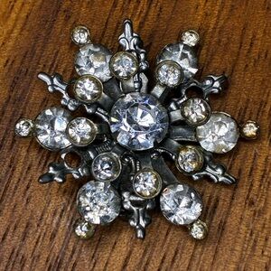 Unique Vintage Silver and White Brooch with Starburst Design